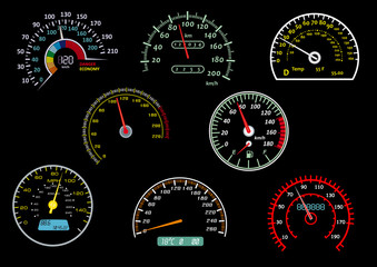 Glowing speedometers isolated on black background