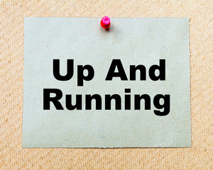 Up And Running written on paper note