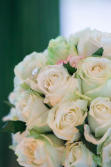 Wedding bouquet of white roses in the bride room