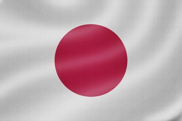Japan flag on the fabric texture background