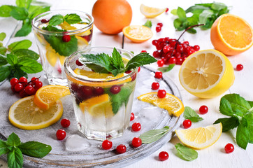 Drink with citrus and berries