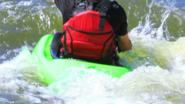 Kayaker  close up  on river have a fan. Rafting team