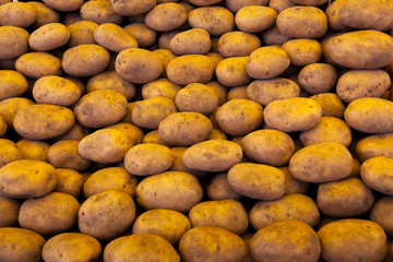 Fresh raw potatoes kept for retail purpose at bazaar