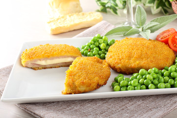Cutlet stuffed with ham and melted cheese - 85296409