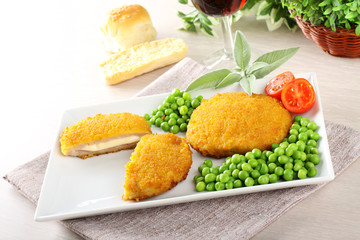 Cutlet stuffed with ham and melted cheese