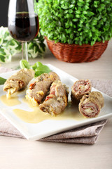 Meat rolls stuffed with bacon and cheese