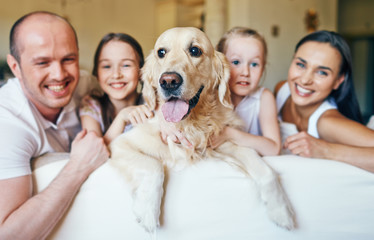 Dog and happy family