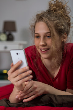 Smiling to the phone