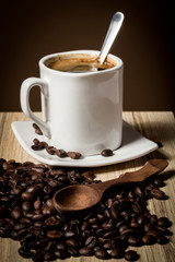 pile of fresh beans, cap, and spoon