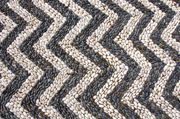 white and black stone background in Rhodes street, Greece