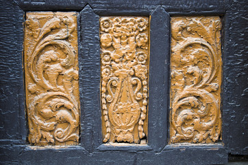 ancient wood carving on door background
