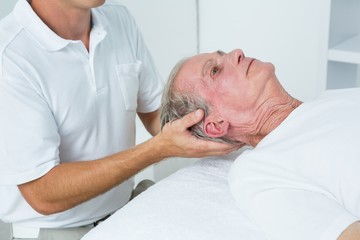 Obraz premium Man receiving neck massage 