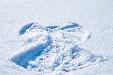 background of white snow with frame of angel
