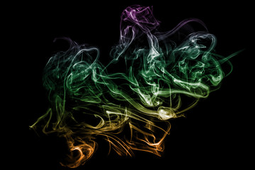 Colorful smoke on black background. Smoke abstraction.