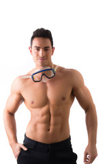 Muscular young man with swimming mask or goggles