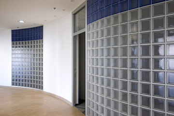 Interior of contemporary office building with glass brick walls