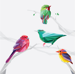 Naklejki  zestaw kolorowych ptaków w stylu wielokąta na gałęziach drzew