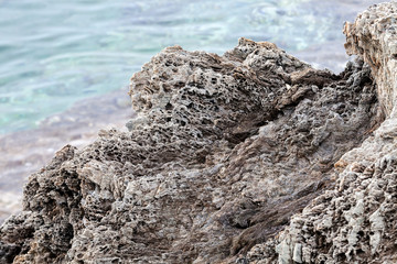 Sharp gray rocks on the beach