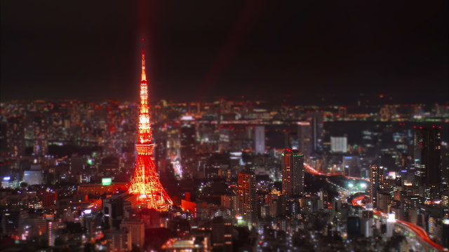 4K Wide aerial time-lapse shot of Tokyo Tower at night, Japan. Full resolution at 4096x2304, easily scalable to Cinema 4K, UHD and HD.
