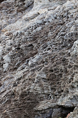 Sharp gray rocks on the beach