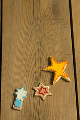 Christmas cookies on picnic table/Sweet cookie in shapes on wooden table