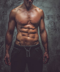 Muscular man posing in studio