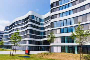 exterior of a modern office building.  Modern building facade