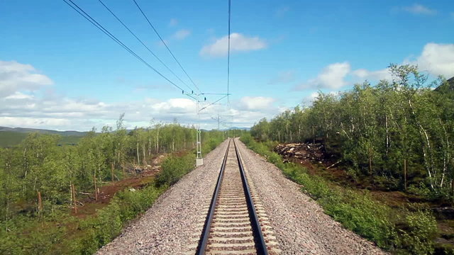 POV travelling along a Iron line Kiruna - Narvik, in Abisko National Park, Lapland, Sweden