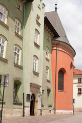 Church of St. Mary and the Cloth Hall in the main Market Square (Rynek Glowny) in the city of Krakow in Poland.