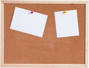 Blank papers pin up on cork board isolated on white background
