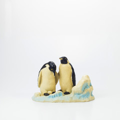 two penguin doll on white background © oatfeelgood