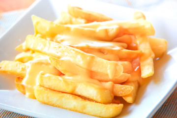 Fried potatoes with cheese