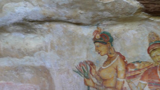 Sigiriya maiden - 5th century frescoes at the ancient rock fortress of Sigiriya in Sri Lanka - 4k
