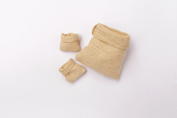 Natural concept, natural color fabric bag on white background