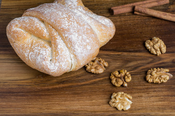Fototapeta premium Breakfast - sweet walnut bun with cinnamon