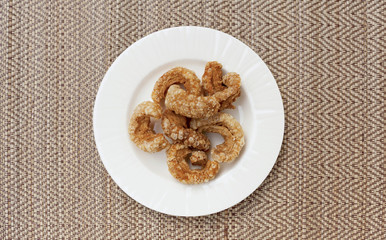 Thai style pork rind snack with space on background