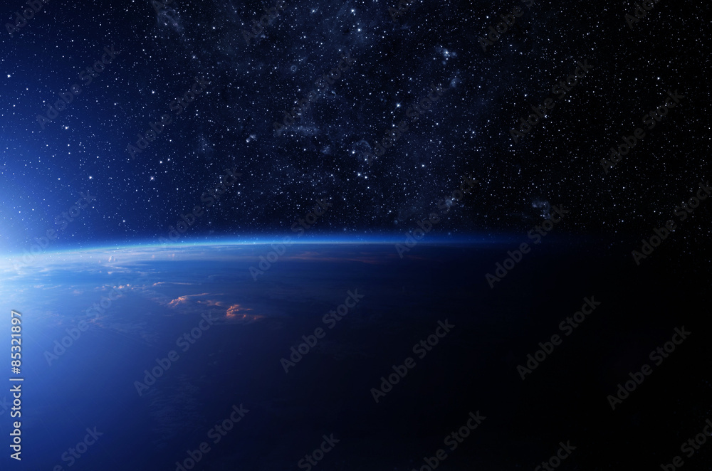 Wall mural image of stars and a planet in the galaxy. some elements of this image furnished by nasa