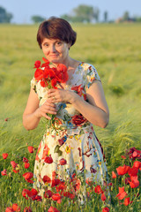 woman  in field of poppies