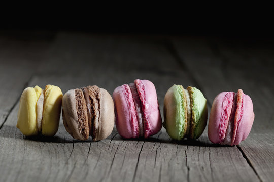 Row of five different macarons