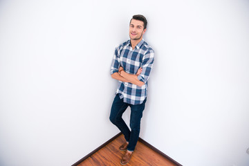 Businessman in casual cloth standing corner of the room