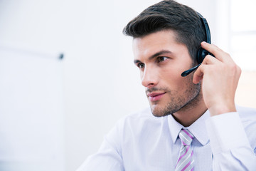 Portrait of a male operator with headset