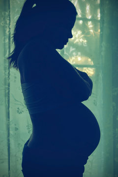 Silhouette of a pregnant woman