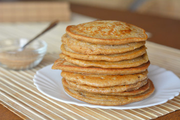 Stack of sweet pancakes with cinnamon sugar 