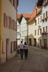 Love Couple Walking Down the Street