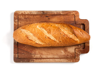 Whole bread on cutting board