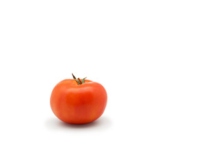 One fresh red tomato isolated on white background