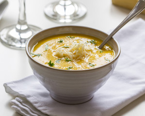 Pumpkin soup with grated cheese