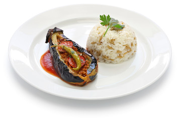 karniyarik pilav, stuffed eggplant with pilaf, turkish cuisine isolated on white background