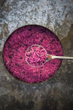 Pink organic basmati rice in bowl