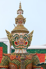 The statue with sword. Wat Pho Temple in Bangkok.